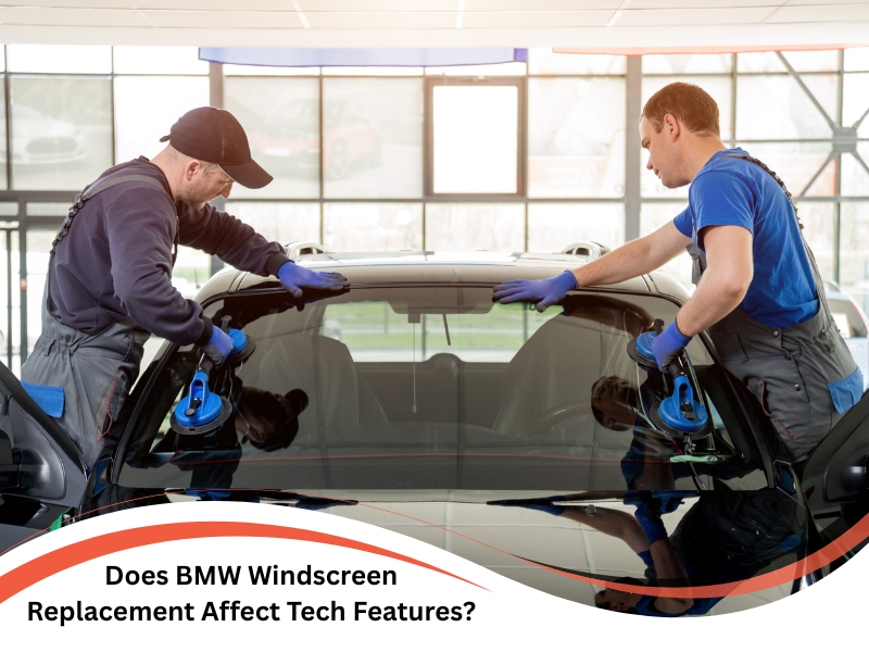 BMW Windscreen Replacement by two technicians using suction tools